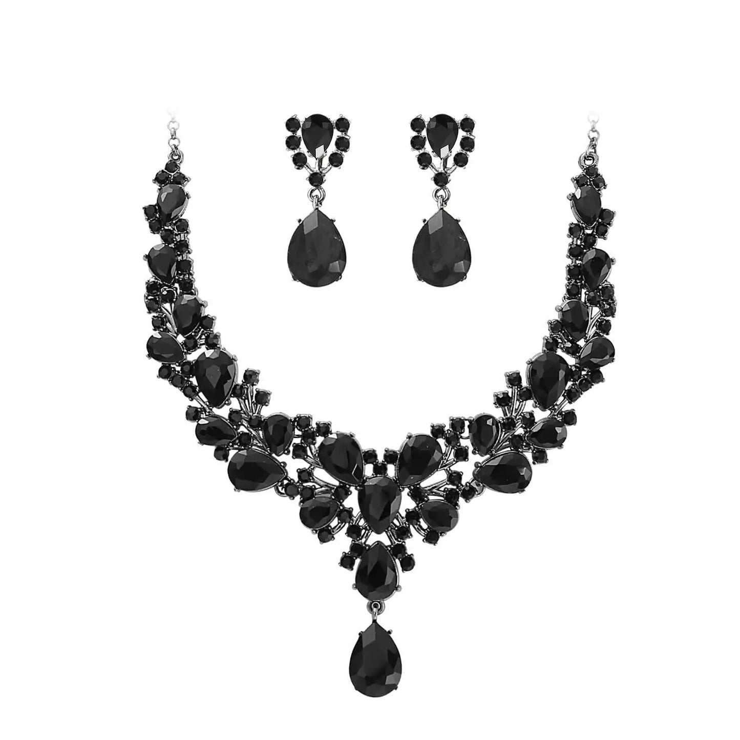 Black jewelry set with necklace and earrings on a white background